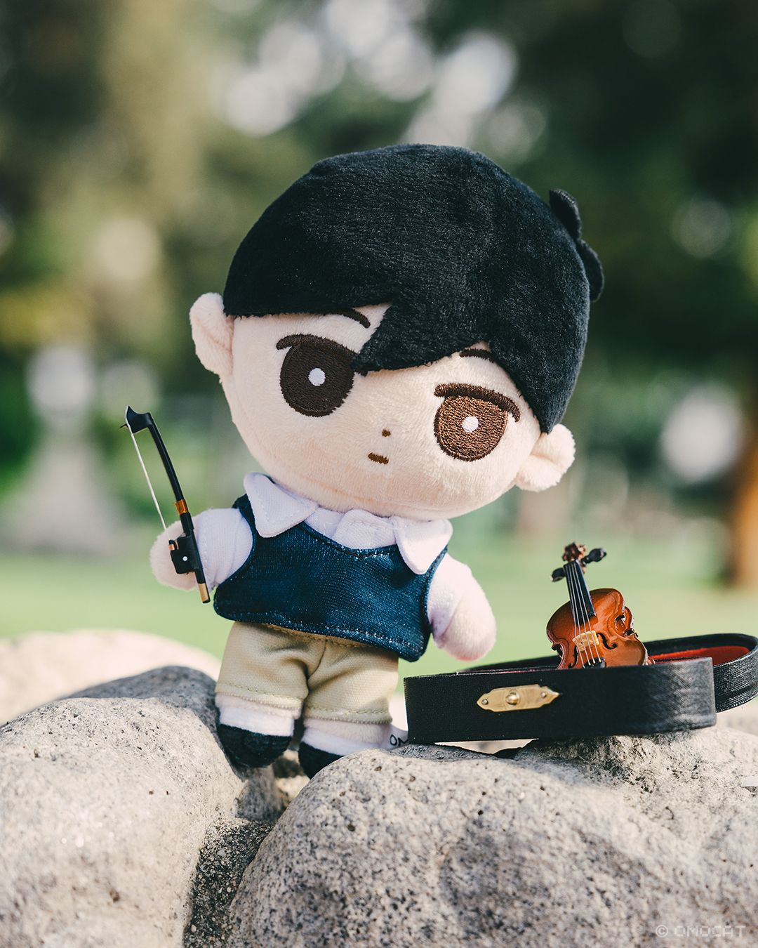 SUNNY tilted his head all on his own. He seems to say, "Check out my neat violin!"